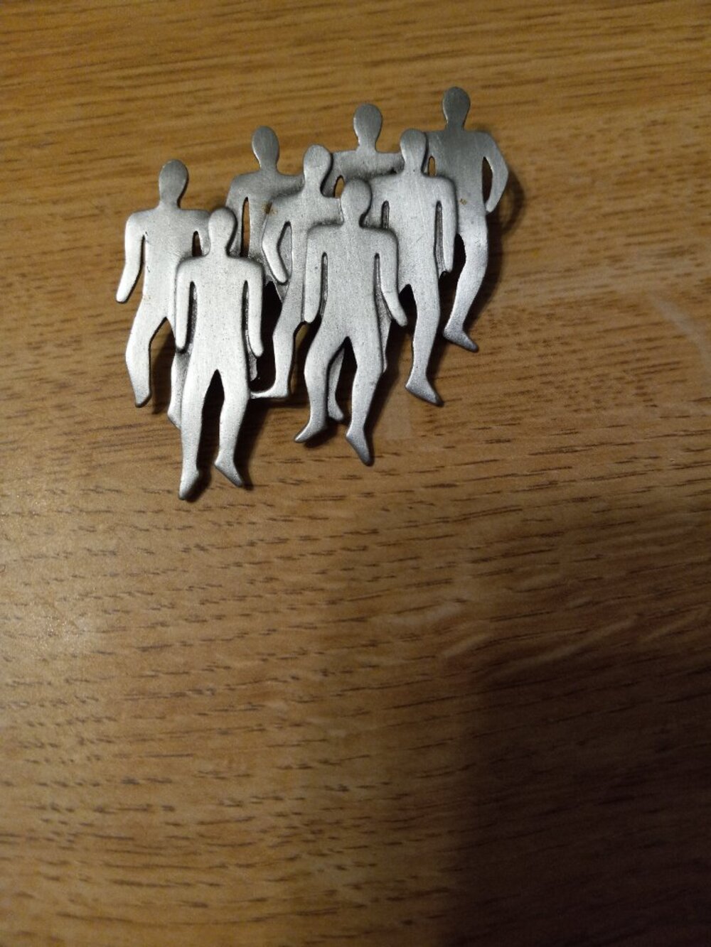 Vintage SIGN " JJ 1988 " modernist silver tone group-of-people or crowd brooch